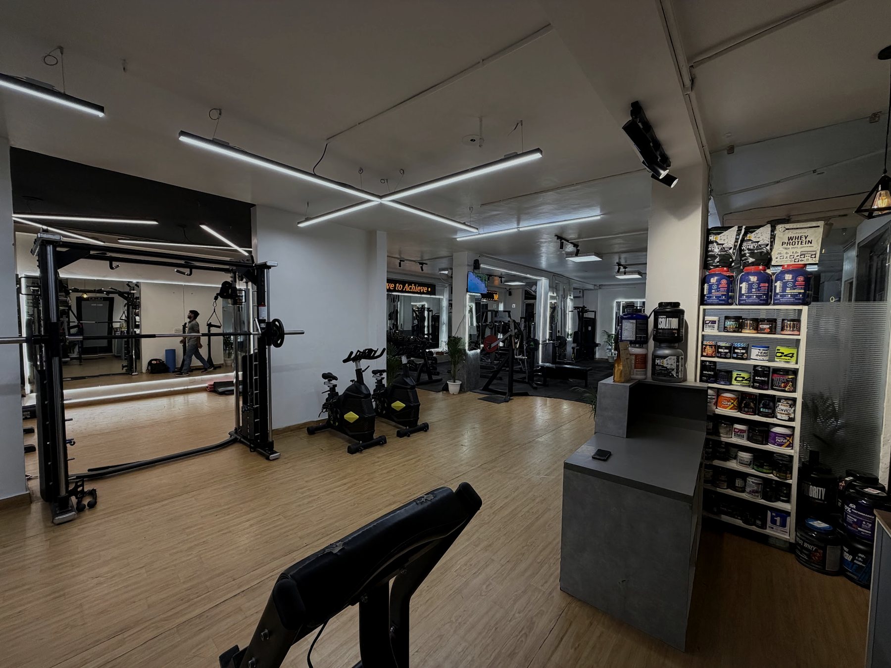 Supplement shelf and cardio area at Total Fitness Kalkaji